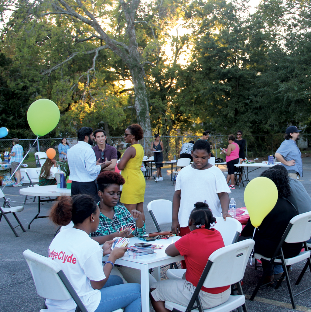 The community gathers for National Night Out 2016 hosted by EEDC & PRH. Photo by Michael McFadden.